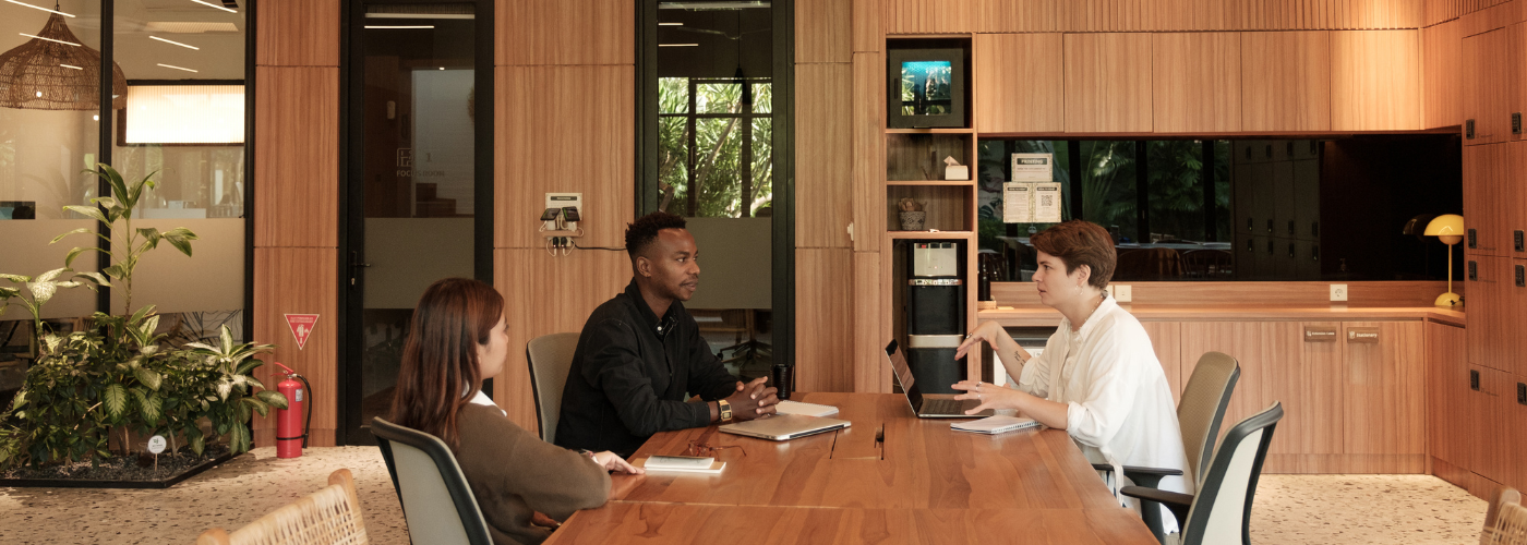 HR professional reviewing employee complaint documents to reduce legal risk and workplace conflict