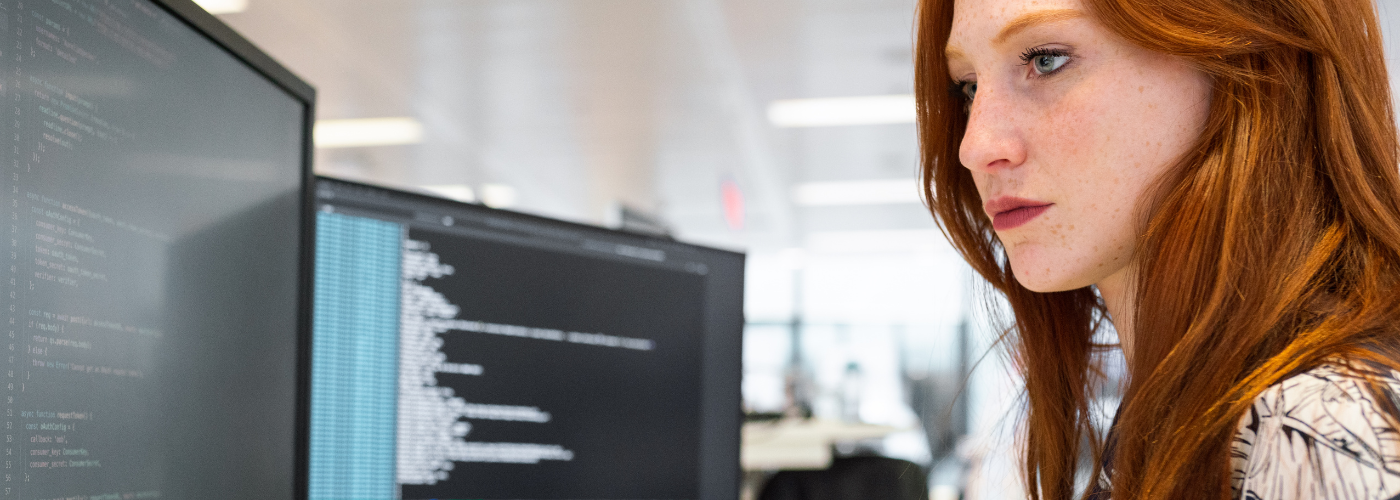 HR professional reviewing immigration policy changes for employee assistance program compliance and workforce support HR professional reviewing immigration policy changes for employee assistance program compliance and workforce support