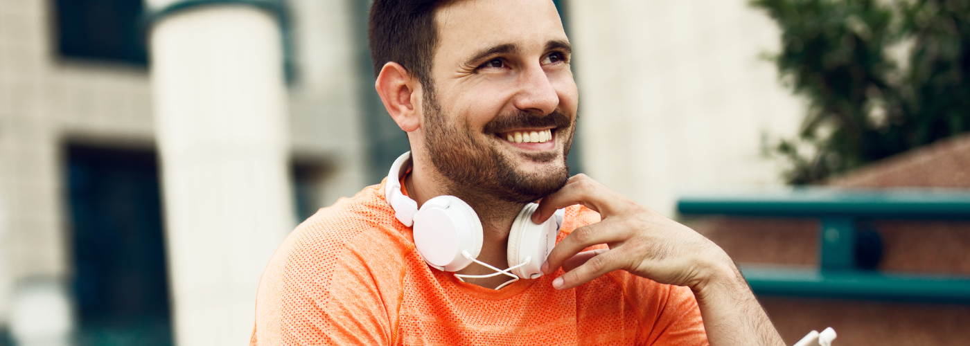 Employee practicing mindfulness outdoors with digital wellness tools and EAP support